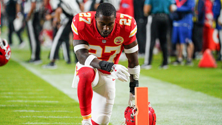 Oct 7, 2024; Kansas City, Missouri, USA; Kansas City Chiefs safety Chamarri Conner (27) kneels in the end zone prior to a game against the New Orleans Saints at GEHA Field at Arrowhead Stadium. Mandatory Credit: Denny Medley-Imagn Images