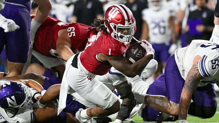 Sep 25, 2026; Bloomington, Indiana, USA; Indiana Hoosiers running back Turbo Richard (1) runs the ball against the Northwestern Wildcats during the first half at Merchants Bank Field at Memorial Stadium. Mandatory Credit: Robert Goddin-Imagn Images Sep 25, 2026; Bloomington, Indiana, USA; Indiana Hoosiers running back Turbo Richard (1) runs the ball against the Northwestern Wildcats during the first half at Merchants Bank Field at Memorial Stadium. Mandatory Credit: Robert Goddin-Imagn Images