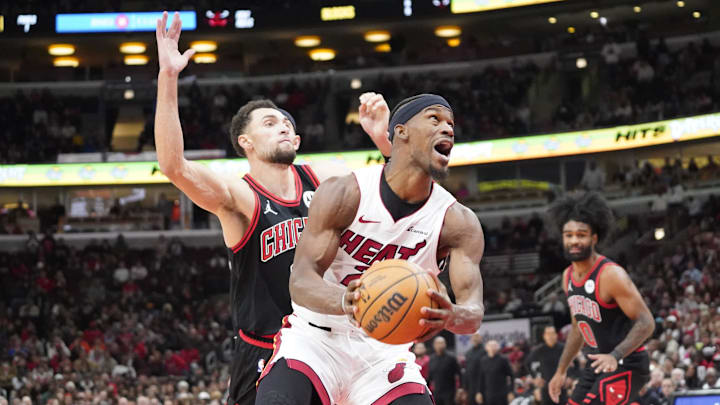 Nov 18, 2023; Chicago, Illinois, USA; Chicago Bulls guard Zach LaVine (8) defends Miami Heat forward Jimmy Butler (22) during the second half at United Center. Mandatory Credit: David Banks-Imagn Images