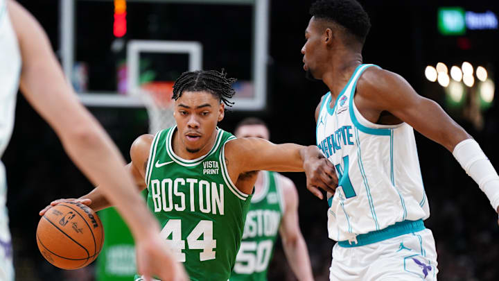 Apr 12, 2024; Boston, Massachusetts, USA; Boston Celtics guard Jaden Springer (44) returns the ball against Charlotte Hornets forward Brandon Miller (24) in the first quarter at TD Garden. Mandatory Credit: David Butler II-Imagn Images Apr 12, 2024; Boston, Massachusetts, USA; Boston Celtics guard Jaden Springer (44) returns the ball against Charlotte Hornets forward Brandon Miller (24) in the first quarter at TD Garden. Mandatory Credit: David Butler II-Imagn Images