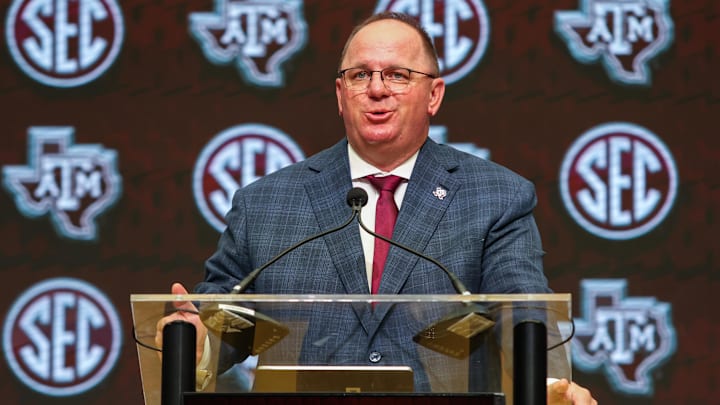 Jul 17, 2025; Atlanta, GA, USA; Texas A&M Aggies head coach Mike Elko talks to the media during the SEC Media Days at Omni Atlanta Hotel. Mandatory Credit: Jordan Godfree-Imagn Images