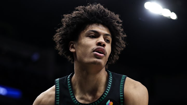Feb 22, 2026; Minneapolis, Minnesota, USA; Minnesota Timberwolves forward Joan Beringer (19) looks on during the second half against the Philadelphia 76ers at Target Center. Mandatory Credit: Matt Krohn-Imagn Images