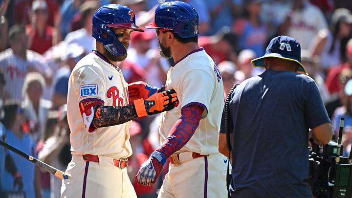 Sep 7, 2026; Philadelphia, Pennsylvania, USA; Philadelphia Phillies designated hitter Kyle Schwarber (12) celebrates his home run with first baseman Bryce Harper (3) during the eighth inning against the Atlanta Braves at Citizens Bank Park. Mandatory Credit: Eric Hartline-Imagn Images