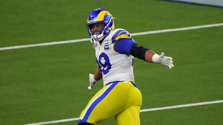 Feb 13, 2022; Inglewood, California, USA; Los Angeles Rams defensive end Aaron Donald (99) celebrates in the fourth quarter against the Cincinnati Bengals in Super Bowl LVI at SoFi Stadium. The Rams defeated the Bengals 23-20. Mandatory Credit: Kirby Lee-USA TODAY Sports