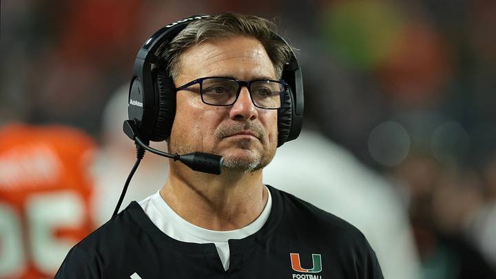 Sep 10, 2026; Miami Gardens, Florida, USA; Miami Hurricanes offensive coordinator and quarterbacks coach Shannon Dawson looks on during the first quarter against the Florida A&M Rattlers at Hard Rock Stadium. Mandatory Credit: Sam Navarro-Imagn Images Sep 10, 2026; Miami Gardens, Florida, USA; Miami Hurricanes offensive coordinator and quarterbacks coach Shannon Dawson looks on during the first quarter against the Florida A&M Rattlers at Hard Rock Stadium. Mandatory Credit: Sam Navarro-Imagn Images