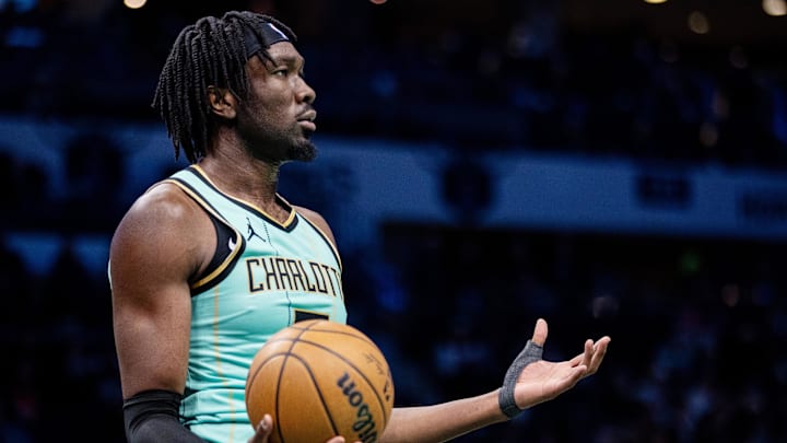 Jan 24, 2025; Charlotte, North Carolina, USA; Charlotte Hornets center Mark Williams (5) reacts after a foul against the Portland Trail Blazers during the third quarter at Spectrum Center. Mandatory Credit: Scott Kinser-Imagn Images