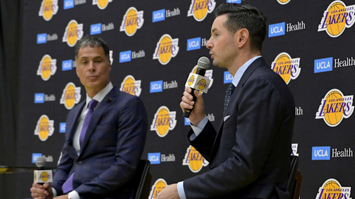 Jun 24, 2024; El Segundo, CA, USA; Los Angeles Lakers general manager Rob Pelinka looks on as head coach JJ Redick speaks to the media during an introductory news conference at the UCLA Health Training Center. Mandatory Credit: Jayne Kamin-Oncea-USA TODAY Sports