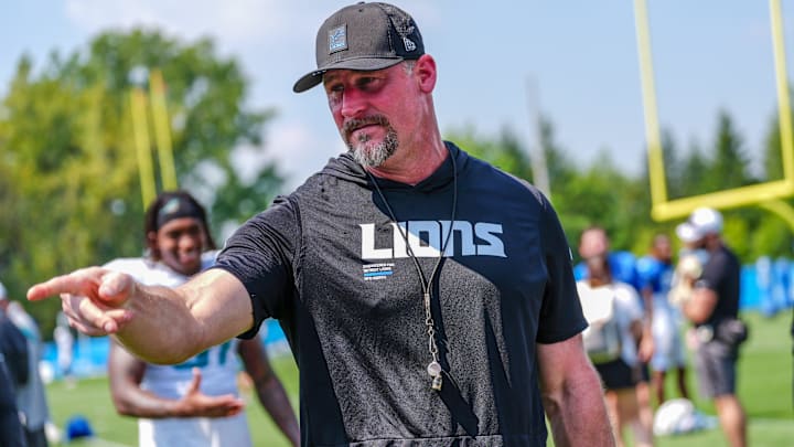 Detroit Lions head coach Dan Campbell talks to staff at the end of the joint practice with the Miami Dolphins at the Lions headquarters and training facility in Allen Park, Thursday, Aug. 14, 2025