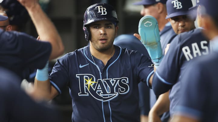 Apr 6, 2025; Arlington, Texas, USA; Tampa Bay Rays designated hitter Jonathan Aranda (62) is congratulated by his teammates after scoring a run during the fourth inning against the Texas Rangers at Globe Life Field. Apr 6, 2025; Arlington, Texas, USA; Tampa Bay Rays designated hitter Jonathan Aranda (62) is congratulated by his teammates after scoring a run during the fourth inning against the Texas Rangers at Globe Life Field.