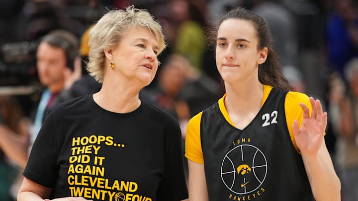 Iowa Hawkeyes head coach Lisa Bluder and Iowa Hawkeyes guard Caitlin Clark (22) talk during practice for the NCAA Women's Final Four championship basketball game between Iowa and South Carolina at Rocket Mortgage Fieldhouse, Saturday, April 6, 2024 in Cleveland. Iowa Hawkeyes head coach Lisa Bluder and Iowa Hawkeyes guard Caitlin Clark (22) talk during practice for the NCAA Women's Final Four championship basketball game between Iowa and South Carolina at Rocket Mortgage Fieldhouse, Saturday, April 6, 2024 in Cleveland.