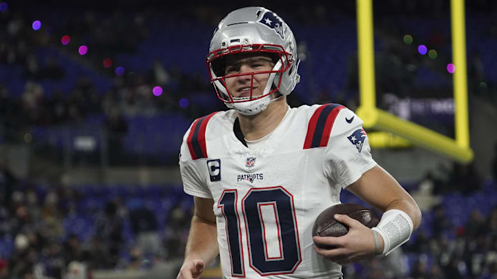 Dec 21, 2025; Baltimore, Maryland, USA;  New England Patriots quarterback Drake Maye (10) warms up prior to the game against the Baltimore Ravens at M&T Bank Stadium. Mandatory Credit: James Lang-Imagn Images
