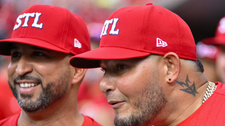 Aug 8, 2025; St. Louis, Missouri, USA; St. Louis Cardinals manager Oliver Marmol (37) and guest coach Yadier Molina (4) look on from the dugout before a game against the Chicago Cubs at Busch Stadium. Mandatory Credit: Jeff Curry-Imagn Images Aug 8, 2025; St. Louis, Missouri, USA; St. Louis Cardinals manager Oliver Marmol (37) and guest coach Yadier Molina (4) look on from the dugout before a game against the Chicago Cubs at Busch Stadium. Mandatory Credit: Jeff Curry-Imagn Images