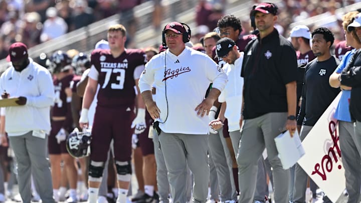 Oct 5, 2024; College Station, Texas, USA; Texas A&M Aggies head coach Mike Elko looks on in the first quarter against the Missouri Tigers at Kyle Field. Mandatory Credit: Maria Lysaker-Imagn Images. Oct 5, 2024; College Station, Texas, USA; Texas A&M Aggies head coach Mike Elko looks on in the first quarter against the Missouri Tigers at Kyle Field. Mandatory Credit: Maria Lysaker-Imagn Images.