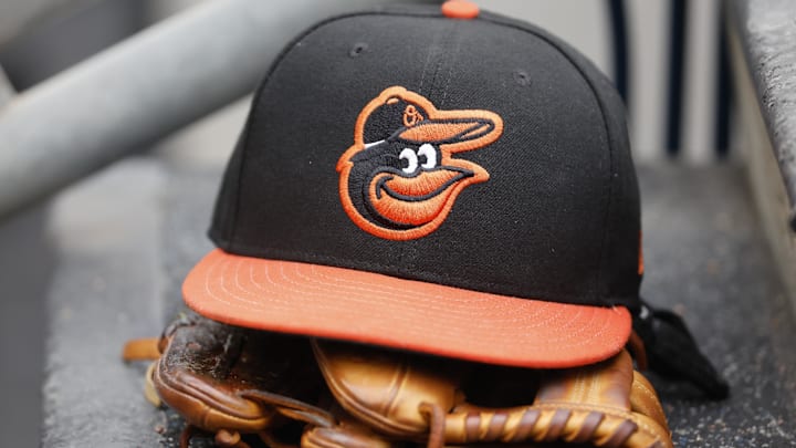 May 14, 2022; Detroit, Michigan, USA;  Baltimore Orioles cap and glove sits in dugout in the second inning against the Detroit Tigers at Comerica Park. 
