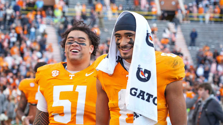 Tennessee defensive lineman Jaxson Moi (51) and Tennessee quarterback Nico Iamaleava (8) smile after winning a NCAA football game between Tennessee and UTEP in Neyland Stadium on Saturday, November 23, 2024.