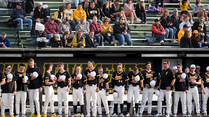 Iowa baseball players line up for the singing of the national anthem before a game against Bradley April 16, 2025 at Duane Banks Field in Iowa City, Iowa.