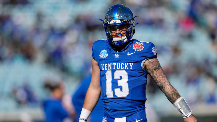 Dec 29, 2023; Jacksonville, FL, USA; Kentucky Wildcats quarterback Devin Leary (13) warms up before Dec 29, 2023; Jacksonville, FL, USA; Kentucky Wildcats quarterback Devin Leary (13) warms up before