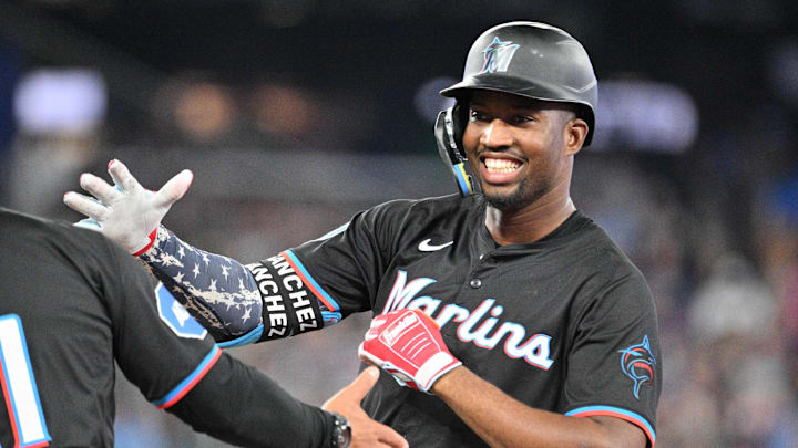 Sep 28, 2024; Toronto, Ontario, CAN; Miami Marlins right fielder Jesus Sanchez (12) celebrates after hitting a single against the Toronto Blue Jays in the eighth inning at Rogers Centre. Sep 28, 2024; Toronto, Ontario, CAN; Miami Marlins right fielder Jesus Sanchez (12) celebrates after hitting a single against the Toronto Blue Jays in the eighth inning at Rogers Centre.