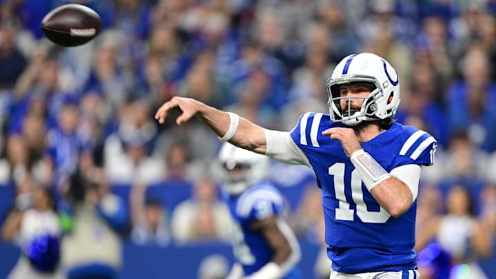 Jan 6, 2024; Indianapolis, Indiana, USA; Indianapolis Colts quarterback Gardner Minshew (10) throws a pass against the Houston Texans during the first quarter at Lucas Oil Stadium. Mandatory Credit: Marc Lebryk-Imagn Images