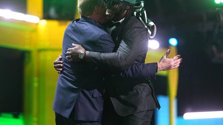 Texas Tech Red Raiders linebacker David Bailey embraces NFL commissioner Roger Goodell after he is selected by the New York Jets as the number two pick during the 2026 NFL Draft at Acrisure Stadium.