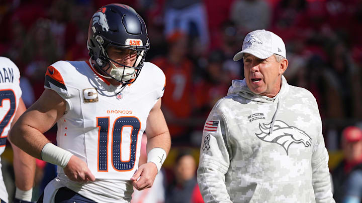 Nov 10, 2024; Kansas City, Missouri, USA; Denver Broncos quarterback Bo Nix (10) talks with head coach Sean Peyton against the Kansas City Chiefs prior to a game at GEHA Field at Arrowhead Stadium. Nov 10, 2024; Kansas City, Missouri, USA; Denver Broncos quarterback Bo Nix (10) talks with head coach Sean Peyton against the Kansas City Chiefs prior to a game at GEHA Field at Arrowhead Stadium.