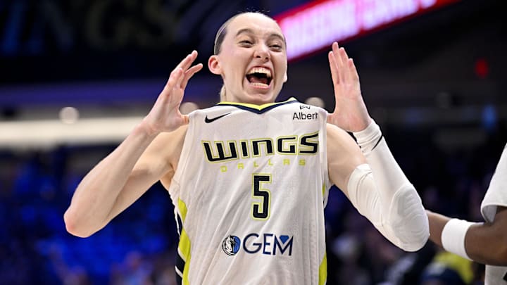 Dallas Wings guard Paige Bueckers (5) celebrates after the game against the Phoenix Mercury at College Park Center. Dallas Wings guard Paige Bueckers (5) celebrates after the game against the Phoenix Mercury at College Park Center.