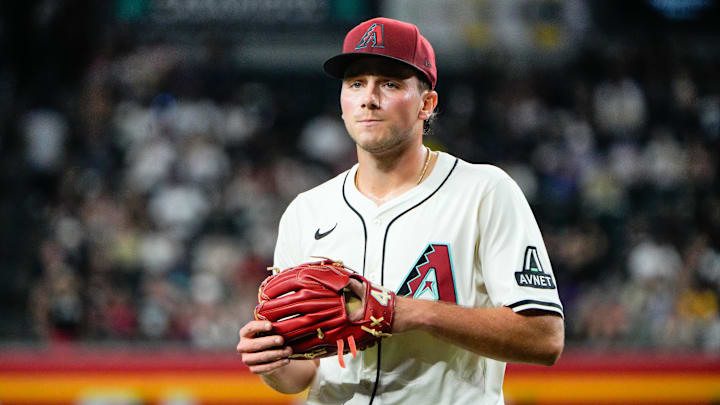 Jun 28, 2025; Phoenix, Arizona, USA; Arizona Diamondbacks starting pitcher Brandon Pfaadt (32) walks to the dugout after the first inning ends during the first inning against the Miami Marlins at Chase Field. Mandatory Credit: Arianna Grainey-Imagn Images
