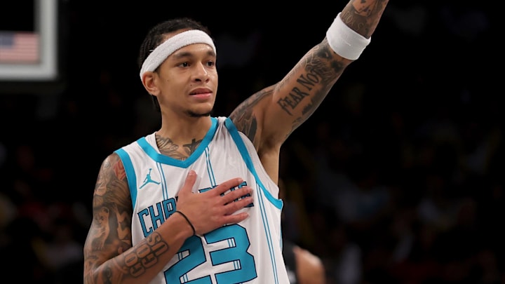 Nov 19, 2024; Brooklyn, New York, USA; Charlotte Hornets guard Tre Mann (23) reacts after receiving a technical foul during the third quarter against the Brooklyn Nets at Barclays Center. Mandatory Credit: Brad Penner-Imagn Images Nov 19, 2024; Brooklyn, New York, USA; Charlotte Hornets guard Tre Mann (23) reacts after receiving a technical foul during the third quarter against the Brooklyn Nets at Barclays Center. Mandatory Credit: Brad Penner-Imagn Images