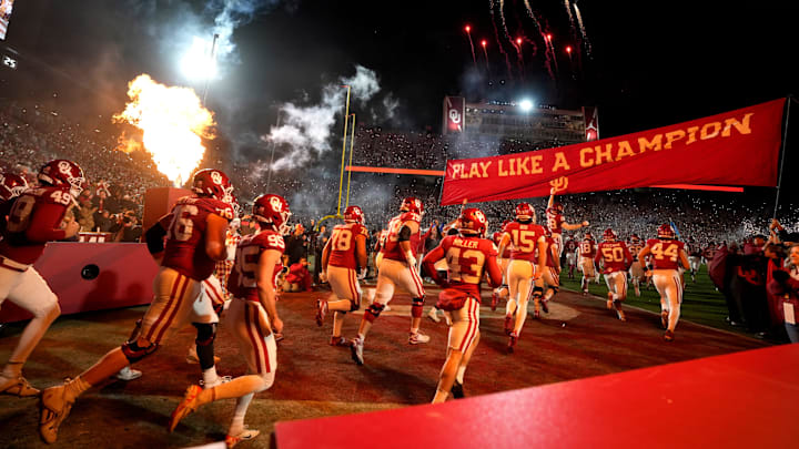 Oklahoma takes the field before a first-round College Football Playoff game between the University of Oklahoma Sooners (OU) and the Alabama Crimson Tide at Gaylord Family - Oklahoma Memorial Stadium in Norman, Okla., Friday, Dec. 19, 2025. Alabama won 34-24.