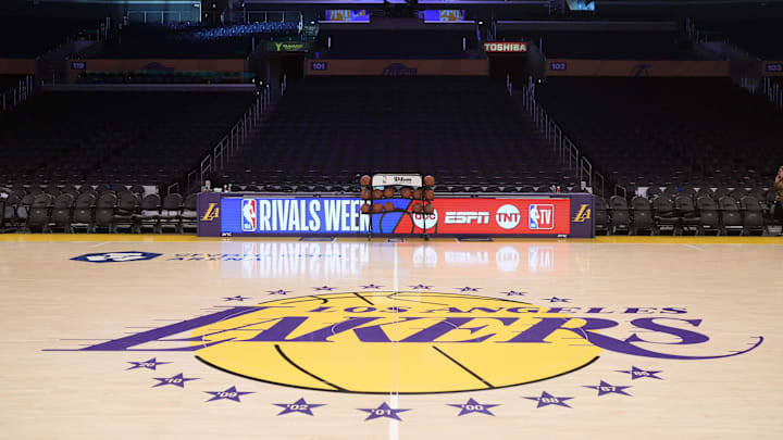 Jan 23, 2025; Los Angeles, California, USA; The Los Angeles Lakers logo at midcourt at the Crypto.com Arena. Mandatory Credit: Kirby Lee-Imagn Images