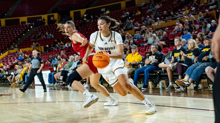 Arizona State Sun Devils McKinna Brackens (21) runs with the ball during a game against the Eastern Washington Eagles at Desert Financial Arena in Tempe, on Nov. 8, 2025. Arizona State Sun Devils McKinna Brackens (21) runs with the ball during a game against the Eastern Washington Eagles at Desert Financial Arena in Tempe, on Nov. 8, 2025.