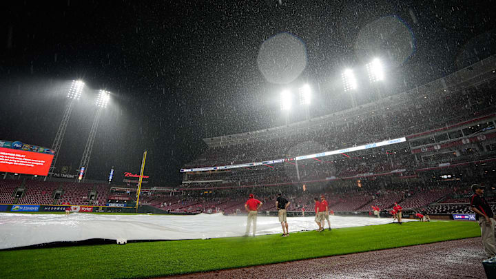 Jun 6, 2025; Cincinnati, OH, USA; The rain starts to pour during the Reds vs. Diamondbacks game at Great American Ball Park on Friday June 6, 2025. Mandatory Credit: Phil Didion-USA TODAY Network via Imagn Images