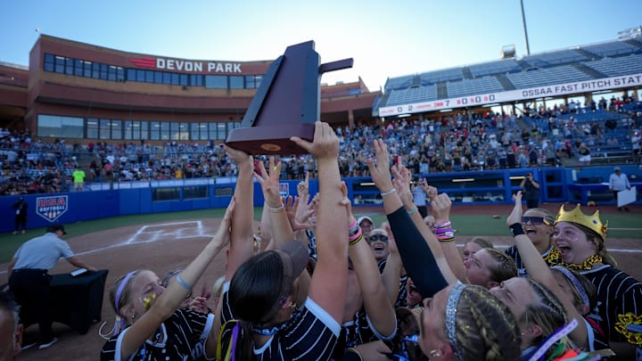 Lone Grove celebrates beating Blanchard in a 4A high school fastpitch softball state championship game at Devon Park in Oklahoma City.