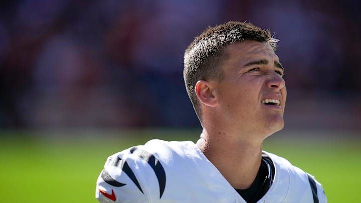 Cincinnati Bengals place kicker Evan McPherson (2) watches the video board in the fourth quarter of the NFL Week 1 game between the Cleveland Browns and the Cincinnati Bengals at Huntington Bank Field in Cleveland on Sunday, Sept. 7, 2025. The Bengals begin the season with a 17-16 win over the Browns.