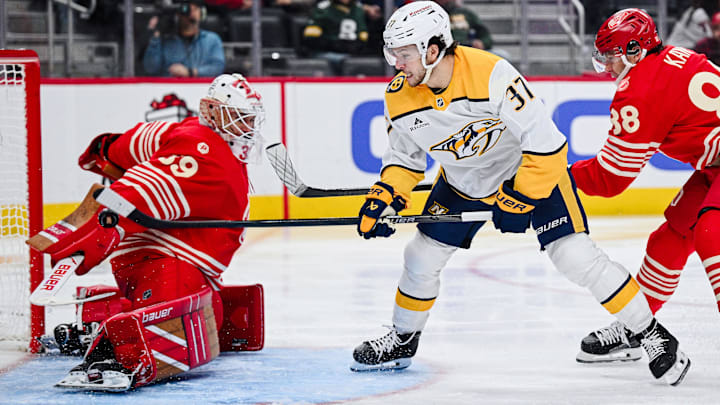 Nov 26, 2025; Detroit, Michigan, USA; Nashville Predators defenseman Nick Blankenburg (37) scores a goal on Detroit Red Wings goaltender Cam Talbot (39) as right wing Patrick Kane (88) defends during the third period at Little Caesars Arena. Mandatory Credit: Tim Fuller-Imagn Images Nov 26, 2025; Detroit, Michigan, USA; Nashville Predators defenseman Nick Blankenburg (37) scores a goal on Detroit Red Wings goaltender Cam Talbot (39) as right wing Patrick Kane (88) defends during the third period at Little Caesars Arena. Mandatory Credit: Tim Fuller-Imagn Images