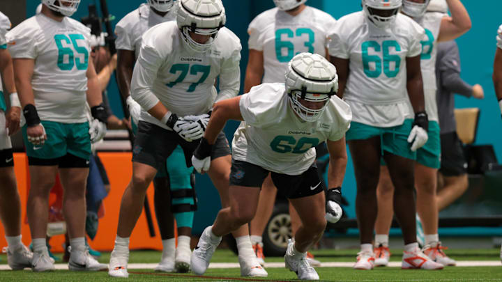 Miami Dolphins center Andrew Meyer (60) works during training camp at Baptist Health Training Complex.