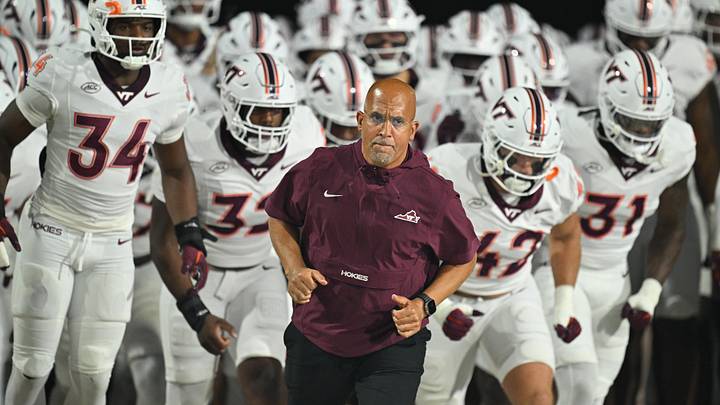 Sep 19, 2026; College Park, Md.; Virginia Tech head coach James Franklin leads his team onto the field before their game against Maryland.