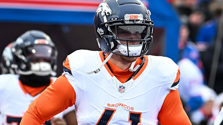 Jan 12, 2025; Orchard Park, New York, USA; Denver Broncos linebacker Drew Sanders (41) enters the field before an AFC wild card game against the Buffalo Bills at Highmark Stadium. Mandatory Credit: Mark Konezny-Imagn Images