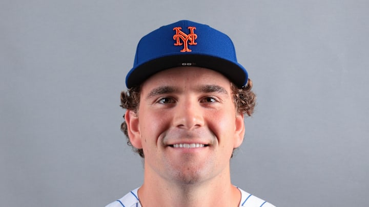 Feb 19, 2026; Port St. Lucie, FL, USA; New York Mets pitcher Ryan Lambert (99) poses for a photo during media day at Clover Park. Mandatory Credit: Sam Navarro-Imagn Images