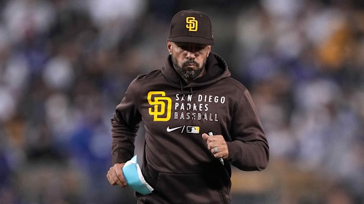 San Diego Padres manager Jayce Tingler (32) runs during the game against the Los Angeles Dodgers at Dodger Stadium. 
