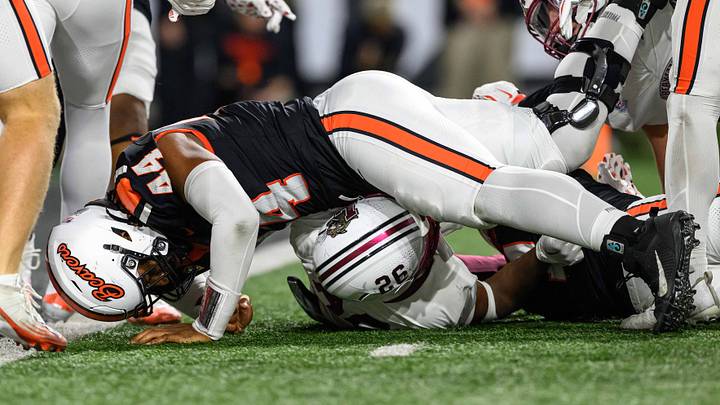 Oct 18, 2025; Corvallis, Oregon, USA; Lafayette Leopards running back Kente Edwards (26) is stopped behind the line by Oregon State Beavers defensive lineman Takari Hickle (44) during the second quarter at Reser Stadium. Mandatory Credit: Craig Strobeck-Imagn Images Oct 18, 2025; Corvallis, Oregon, USA; Lafayette Leopards running back Kente Edwards (26) is stopped behind the line by Oregon State Beavers defensive lineman Takari Hickle (44) during the second quarter at Reser Stadium. Mandatory Credit: Craig Strobeck-Imagn Images