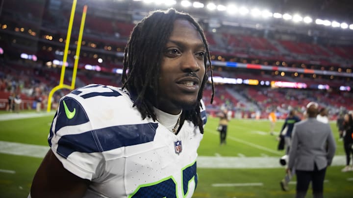 Dec 8, 2024; Glendale, Arizona, USA; Seattle Seahawks cornerback Riq Woolen (27) against the Arizona Cardinals at State Farm Stadium. Mandatory Credit: Mark J. Rebilas-Imagn Images