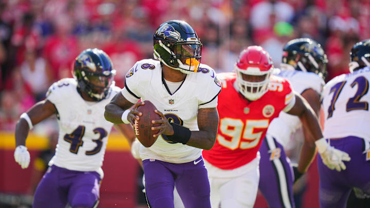 Sep 28, 2025; Kansas City, Missouri, USA; Baltimore Ravens quarterback Lamar Jackson (8) drops back to pass during the first half against the Kansas City Chiefs at GEHA Field at Arrowhead Stadium. Mandatory Credit: Jay Biggerstaff-Imagn Images