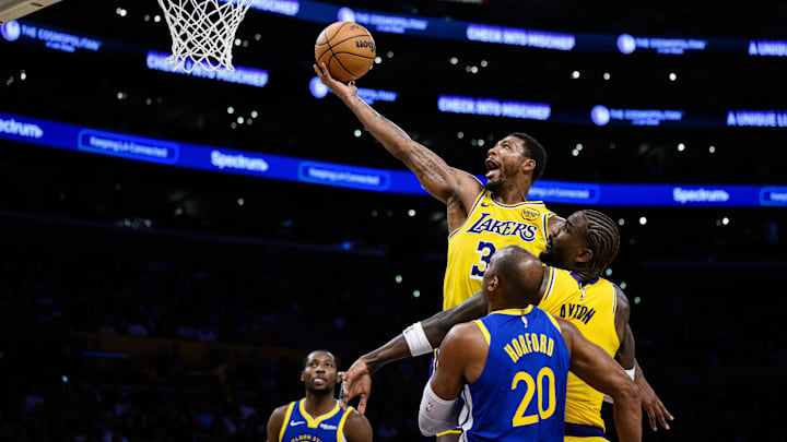 Oct 21, 2025; Los Angeles, California, USA; Los Angeles Lakers guard Marcus Smart (36) shoots during the first half against the Golden State Warriors at Crypto.com Arena. Mandatory Credit: William Liang-Imagn Images