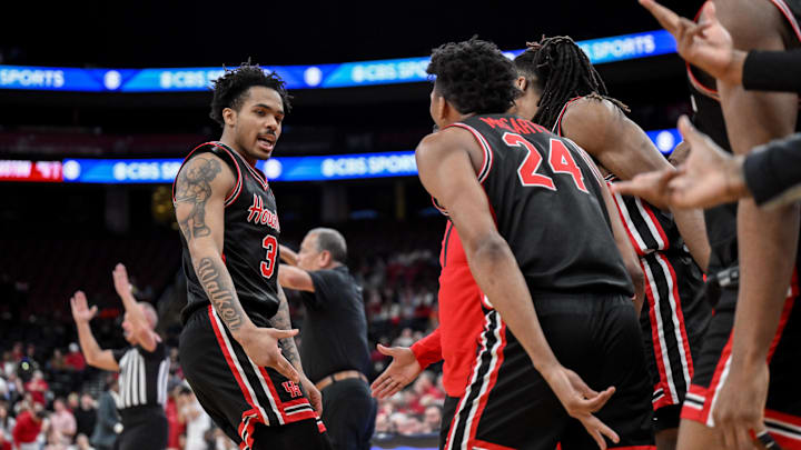 Dec 20, 2025; Newark, New Jersey, USA; Houston Cougars guard Ramon Walker Jr. (3) reacts after making a shot against the Arkansas Razorbacks during the second half at Prudential Center. Mandatory Credit: John Jones-Imagn Images Dec 20, 2025; Newark, New Jersey, USA; Houston Cougars guard Ramon Walker Jr. (3) reacts after making a shot against the Arkansas Razorbacks during the second half at Prudential Center. Mandatory Credit: John Jones-Imagn Images