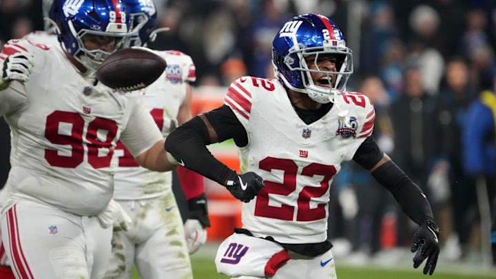Nov 10, 2024; Munich, Germany; New York Giants cornerback Dru Phillips (22) reacts against the Carolina Panthers in the second half during the 2024 NFL Munich Game at Allianz Arena. Mandatory Credit: Kirby Lee-Imagn Images Nov 10, 2024; Munich, Germany; New York Giants cornerback Dru Phillips (22) reacts against the Carolina Panthers in the second half during the 2024 NFL Munich Game at Allianz Arena. Mandatory Credit: Kirby Lee-Imagn Images