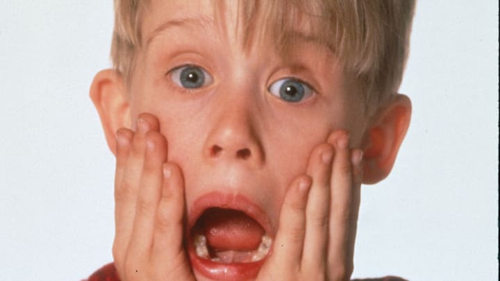 HOME ALONE - Eight year old Kevin MacAllister (Macaulay Culkin) gets lost in the shuffle as his