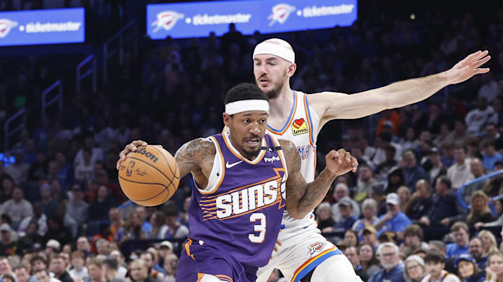 Feb 5, 2025; Oklahoma City, Oklahoma, USA; Phoenix Suns guard Bradley Beal (3) drives around Oklahoma City Thunder guard Alex Caruso (9) during the second half of a game at Paycom Center. Mandatory Credit: Alonzo Adams-Imagn Images Feb 5, 2025; Oklahoma City, Oklahoma, USA; Phoenix Suns guard Bradley Beal (3) drives around Oklahoma City Thunder guard Alex Caruso (9) during the second half of a game at Paycom Center. Mandatory Credit: Alonzo Adams-Imagn Images