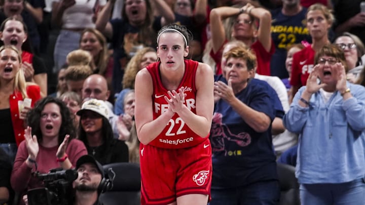 Sep 13, 2024; Indianapolis, Indiana, USA; Indiana Fever guard Caitlin Clark (22) celebrates while on defense Friday, Sept. 13, 2024, during a game between the Indiana Fever and the Las Vegas Aces on Friday, Sept. 13, 2024, at Gainbridge Fieldhouse in Indianapolis. The Aces defeated the Fever, 78-74.  Mandatory Credit:  Grace Smith/USA TODAY Network via Imagn Images