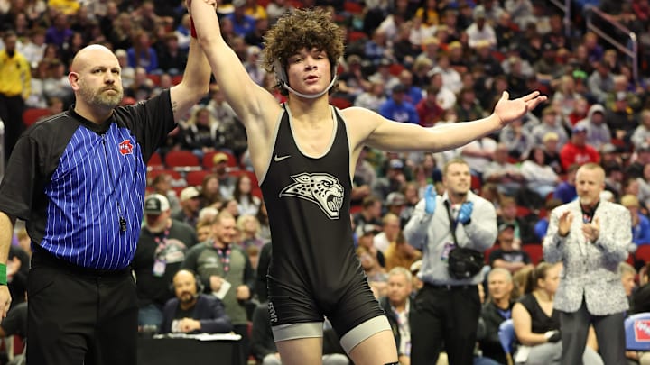Feb 22, 2025; Des Moines, Iowa, USA; 157 pounds: No. 1 Maximus Dhabolt of Ankeny Centennial wins over No. 2 Bas Diaz of Waverly-Shell Rock 7 to 2 in the 3A IHSAA State Wrestling Championship Finals at Wells Fargo Arena. Mandatory Credit: Reese Strickland-The Des Moines Register
